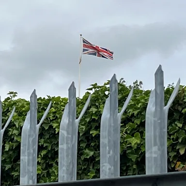 Close-up of galvanised Traditional Heavy palisade fencing